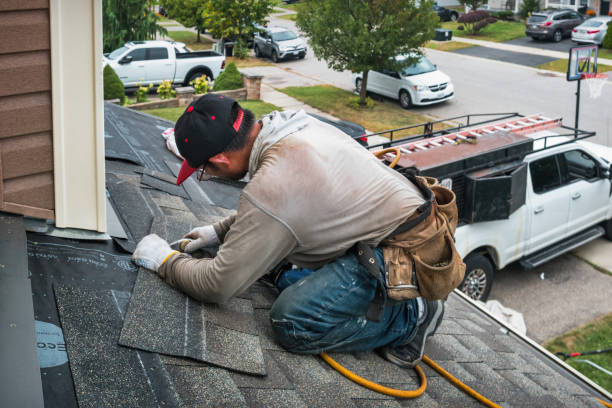 Professional Emergency Roof Repair technician working in Cliffside Park, NJ